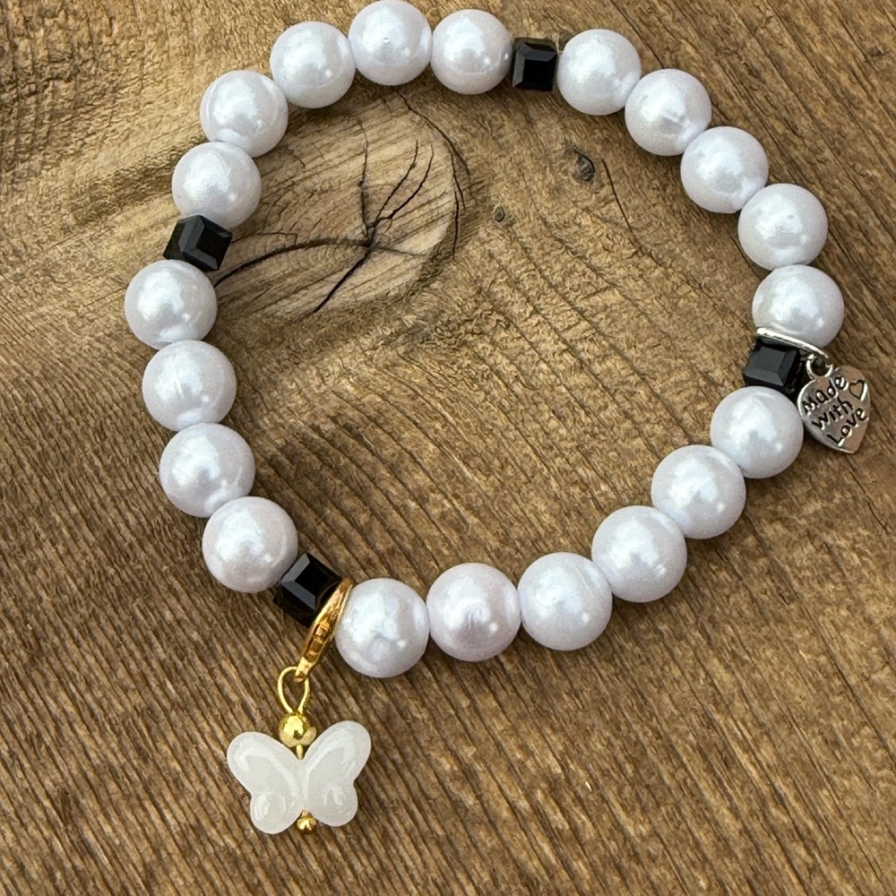 Elegant Pearl Bracelet with Butterfly Charm